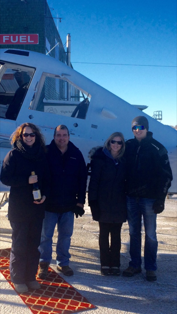 Farr Air team celebrating new plane with champagne